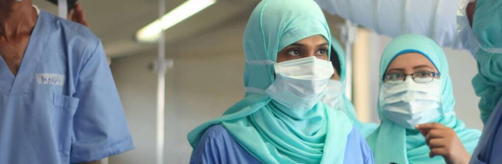 Yemen hospital staff in centre CROPPED